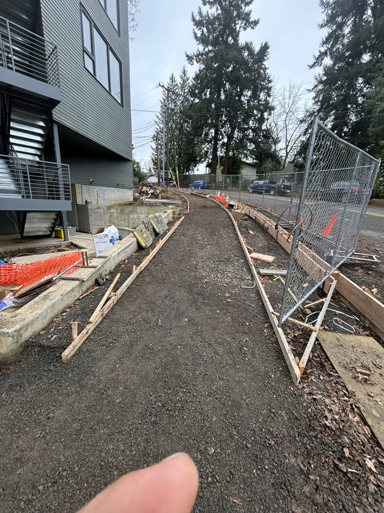 Driveway forms and gravel base prepared in Portland